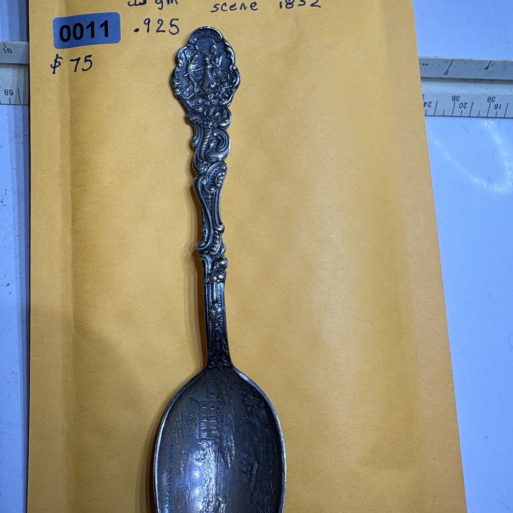 Intricately Designed Silver Spoon